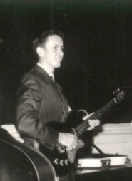 A photograph of young Herb Munson in High School band.